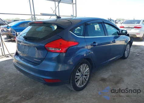 2018 Ford Focus Titanium z USA, uszkodzony, nr VIN 1FADP3N21JL230788
